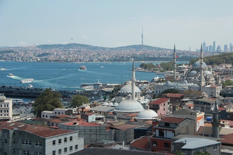 A stunning aerial view of Istanbul's skyline featuring historic mosques and the Bosphorus Strait - Stafford Affiliates Travel