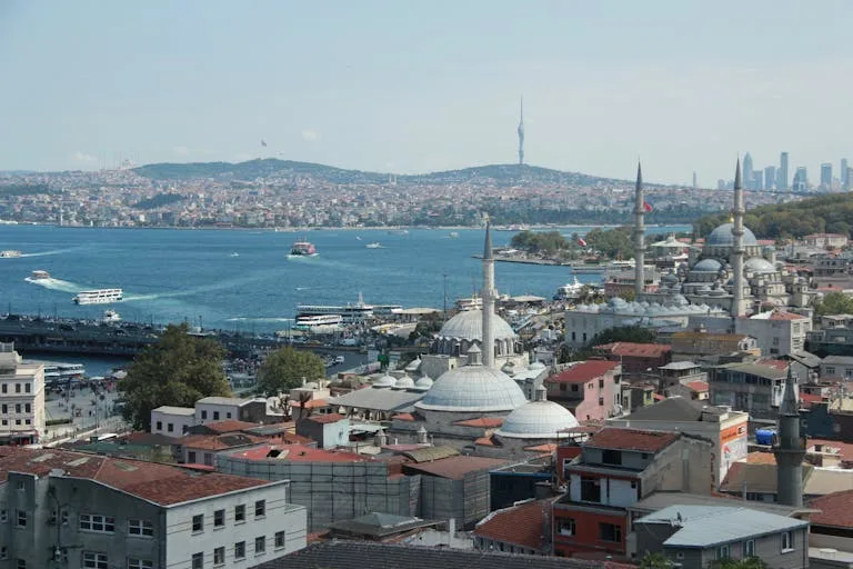 A stunning aerial view of Istanbul's skyline featuring historic mosques and the Bosphorus Strait - Stafford Affiliates Travel