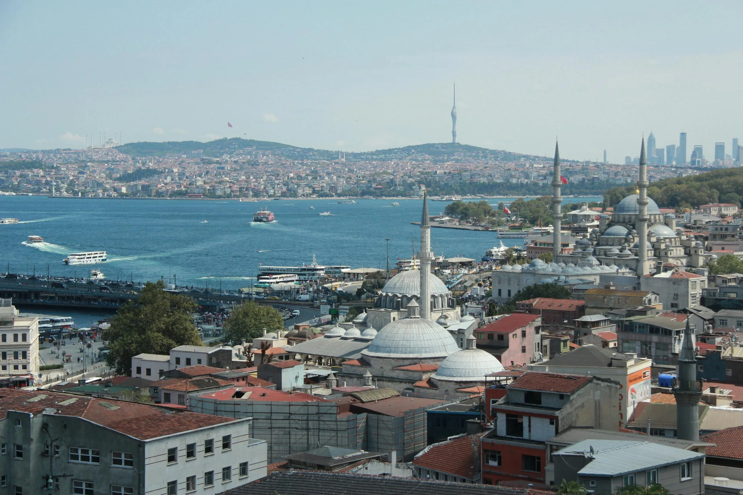 A stunning aerial view of Istanbul's skyline featuring historic mosques and the Bosphorus Strait - Stafford Affiliates Travel