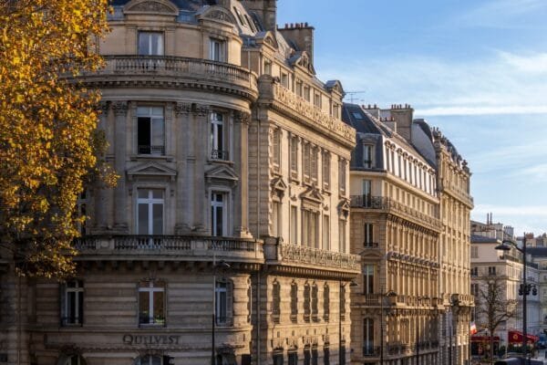 Elegant historic buildings on Boulevard Saint-Germain in Paris during daylight - Stafford Affiliates Travel