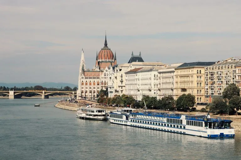 Scenic view of the Hungarian Parliament buildings alongside the Danube River in Budapest, Hungary. Stafford Affiliates Travel