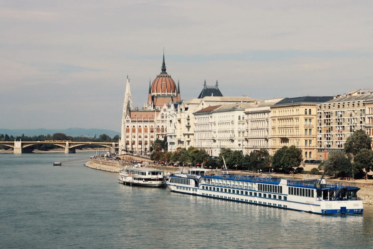 Scenic view of the Hungarian Parliament buildings alongside the Danube River in Budapest, Hungary. Stafford Affiliates Travel